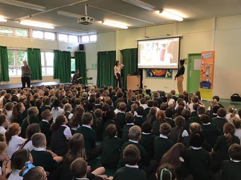 Sarah and Lynn teaching pupils about recycling